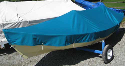 How do you put a canvas cover on your sailboat?