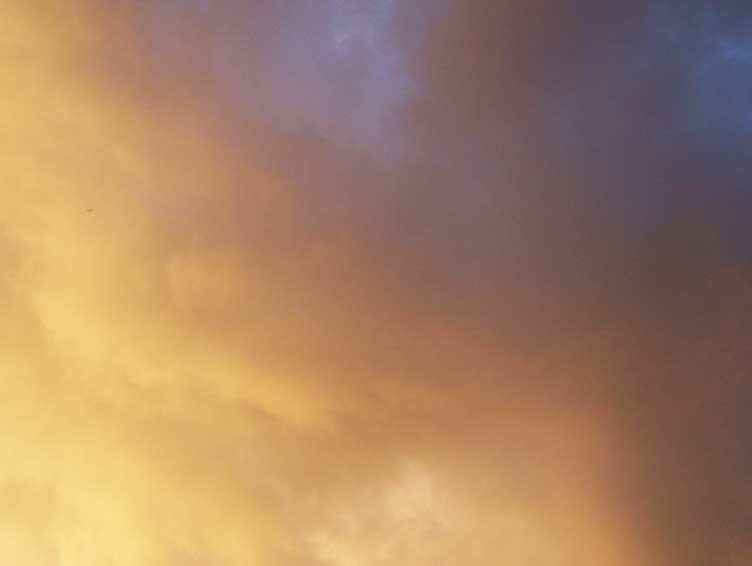Just before sunset, the clouds turned yellow for a few minutes only Cloud photos
