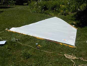 My scamp sail laced on yard and tied to boom sail